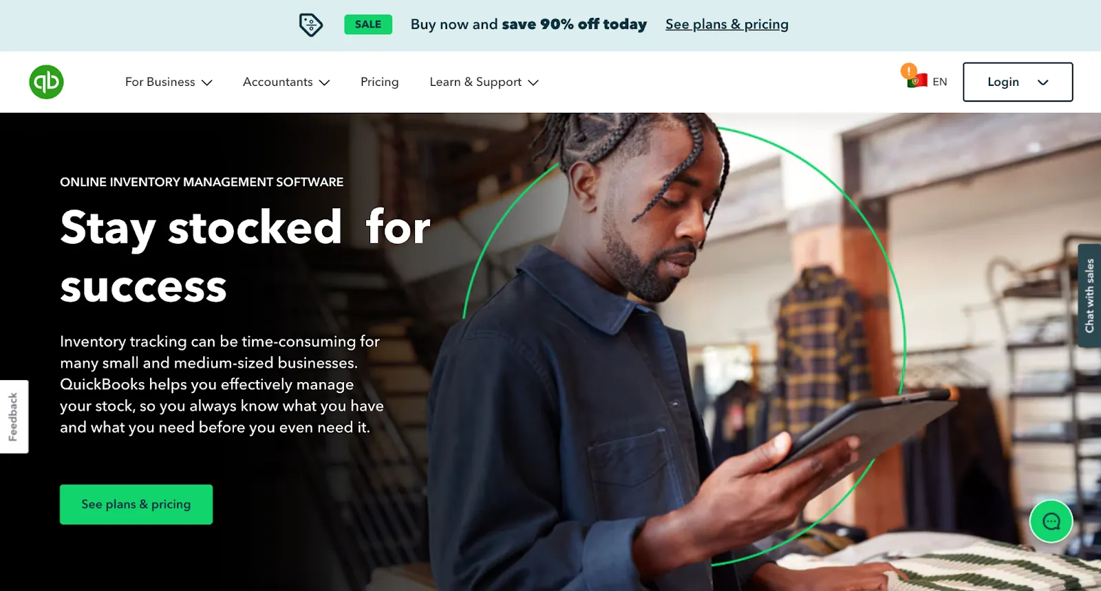 QuickBooks inventory page with a man using a tablet in a clothing shop