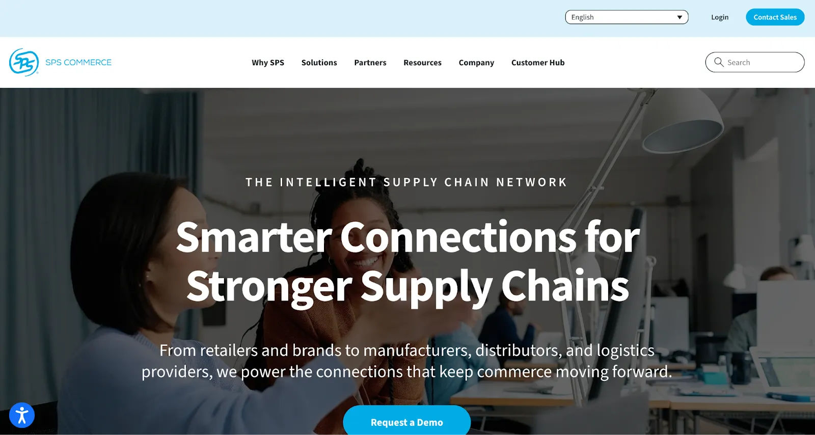 SPS Commerce homepage with a photo of colleagues talking in an office