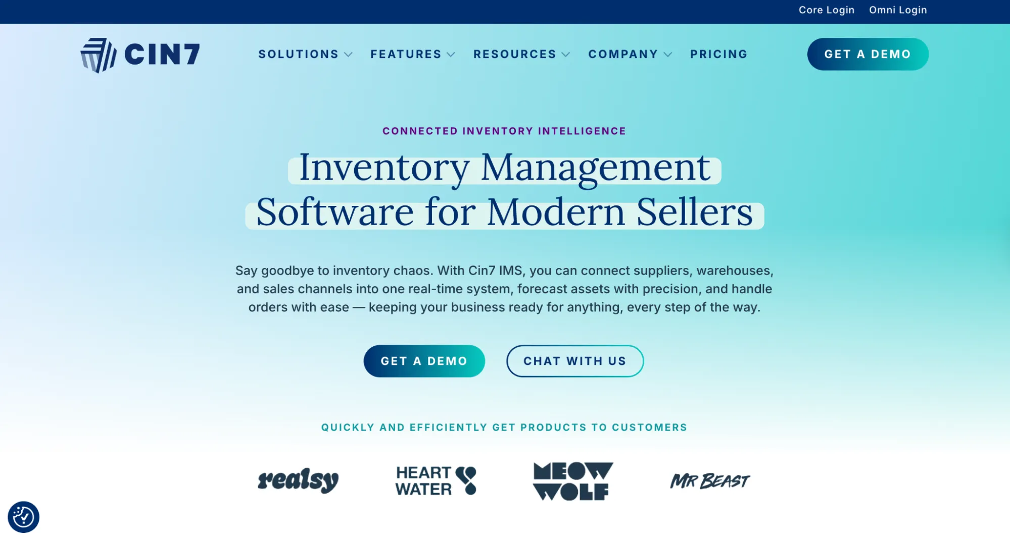 Cin7 homepage with a centered inventory management headline and demo and chat buttons