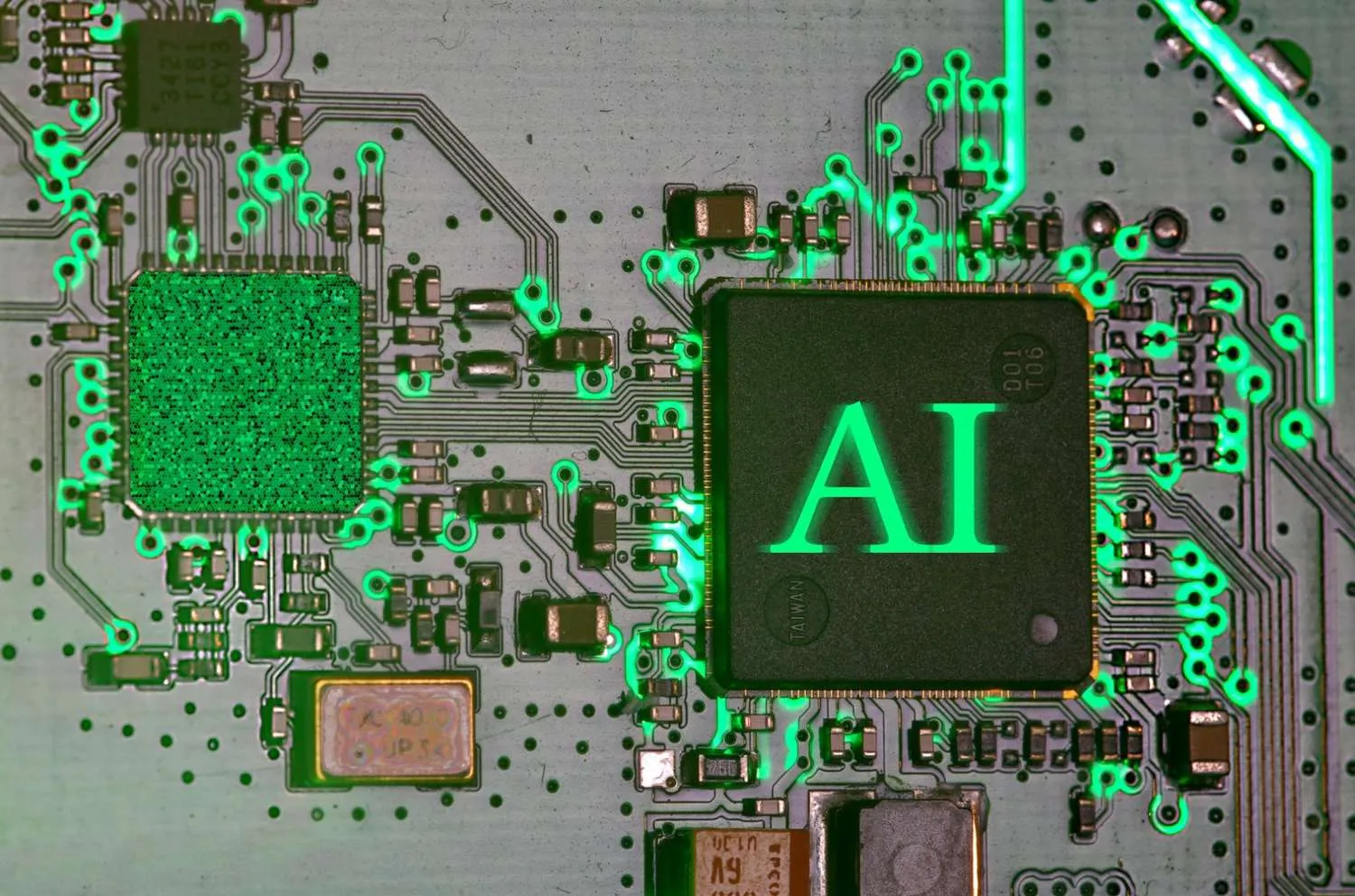 Circuit board with a chip labeled AI and glowing green traces